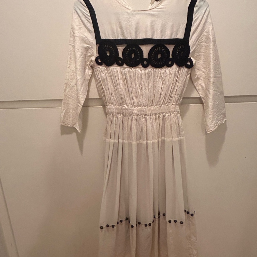 Elegant White Dress with Black Accents